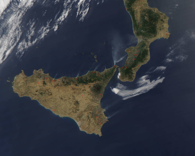 In this image collected by NASA’s Aqua satellite using the Moderate Resolution Imaging Spectroradiometer instrument on July 30, 2017 the actively burning areas are outlined in red. Each hot spot, which appears as a red mark, is an area where the thermal detectors on the MODIS instrument recognized temperatures higher than background. When accompanied by plumes of smoke, as in this image, such hot spots are diagnostic for fire. NASA image courtesy Jeff Schmaltz LANCE/EOSDIS MODIS Rapid Response Team, GSFC